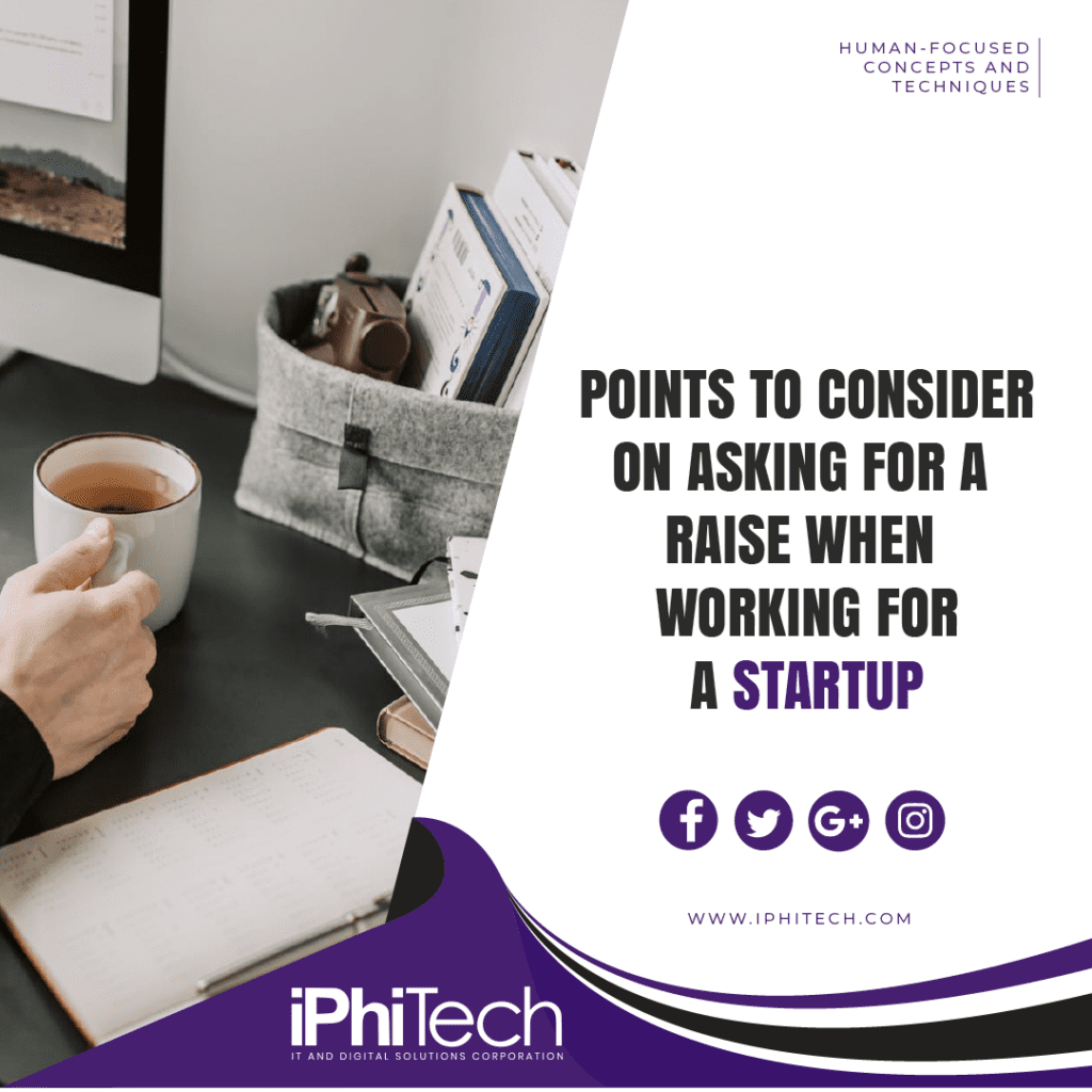 Illustration of a hand holding a cup of tea, with an iMac visible and books on the desk. Text reads 'Points to Consider when Asking for a Raise When Working for a Startup' with iPhiTech website address and social media logos for Facebook, Twitter, Google+ and Instagram present